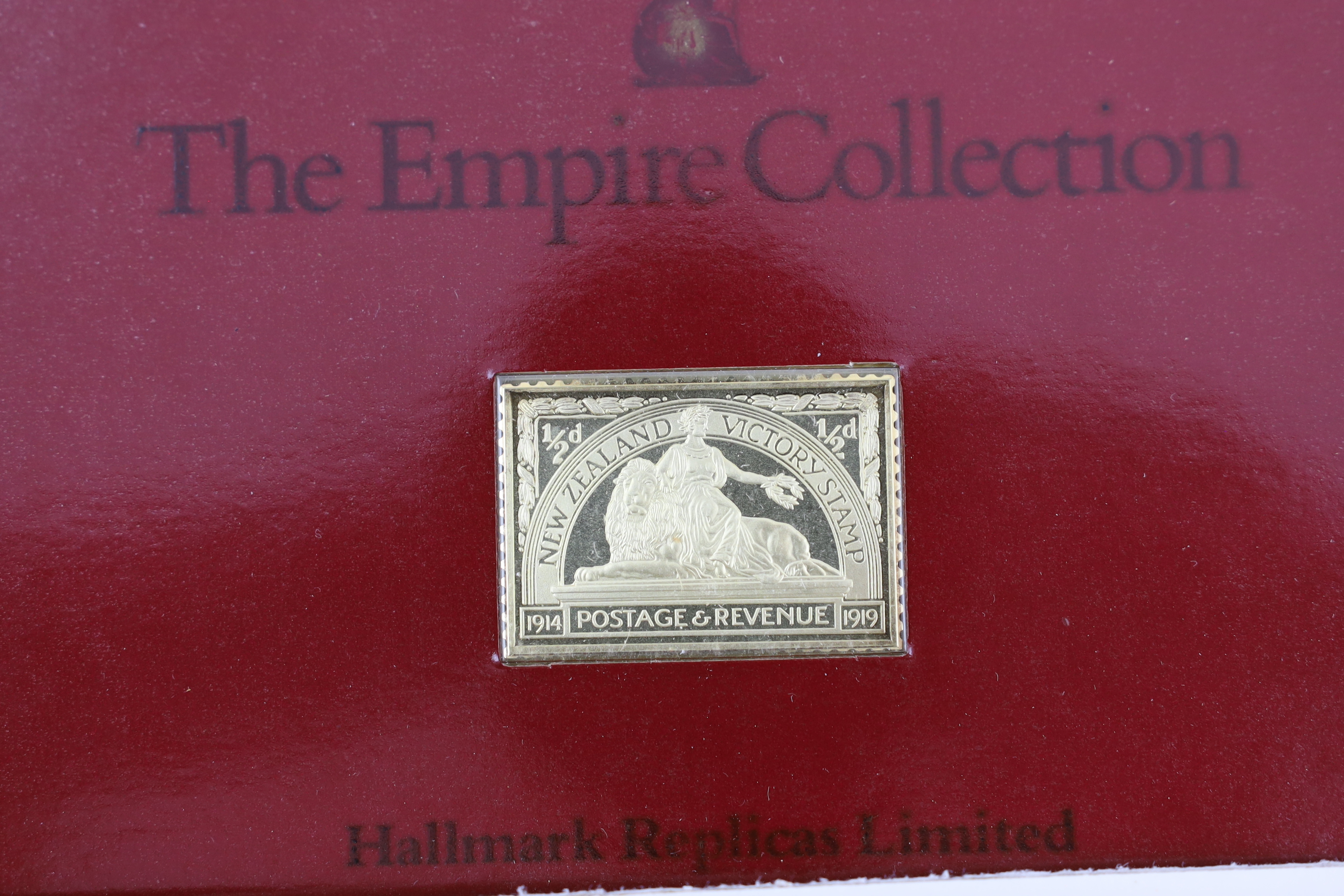 ‘The Empire Collection’, twenty five silver-gilt stamp replica ingots, in individual packets, approx. 471g